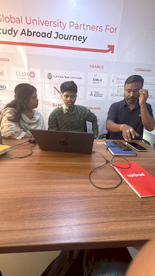 upGrad Surat office - student and parents with the counselling team after their study abroad session